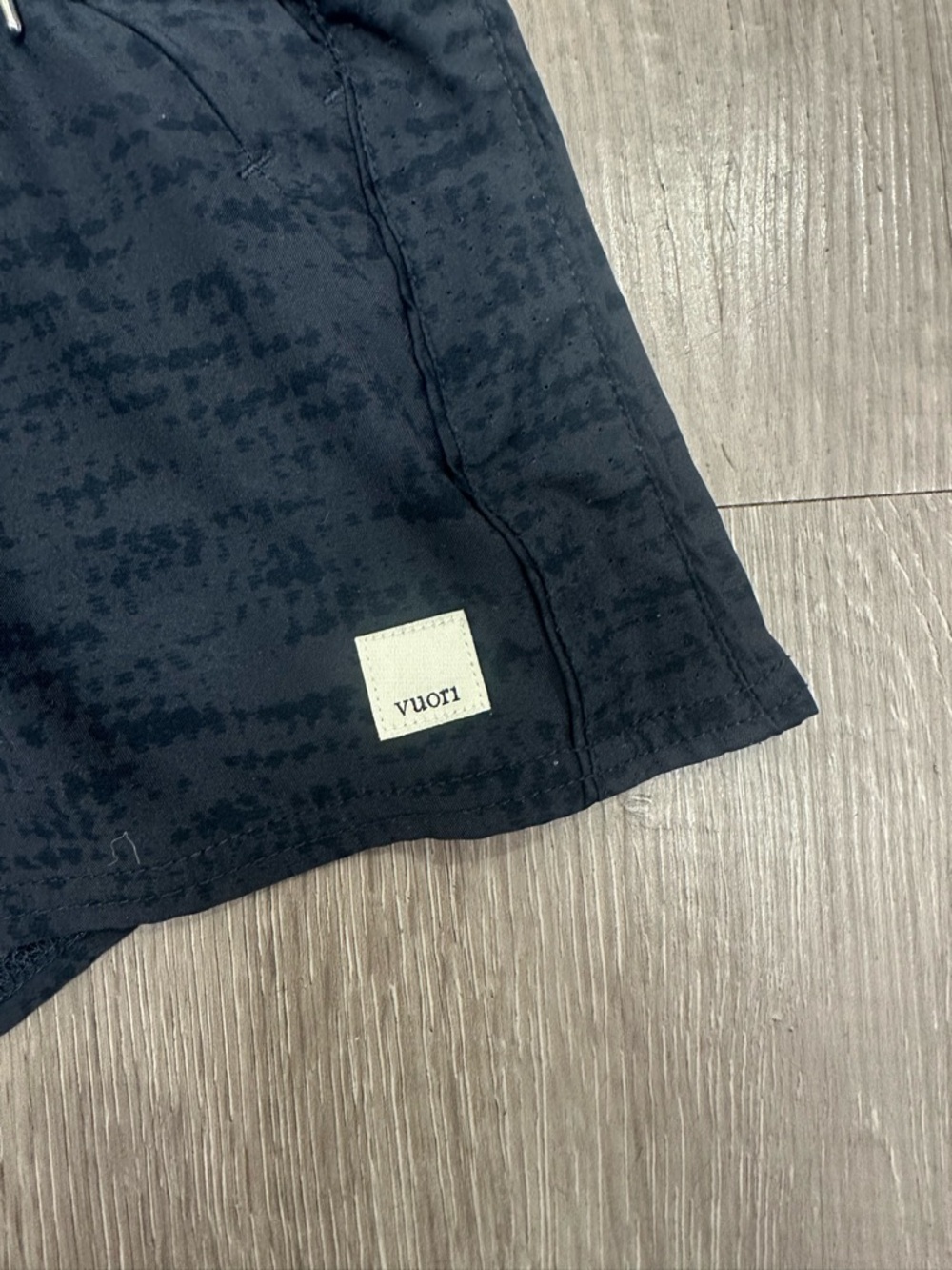 Vuori Navy & Black Subtle Pattern Shorts with Cream Vuori Logo Patch